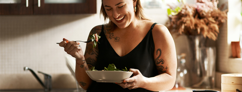 Woman with a bowl of food